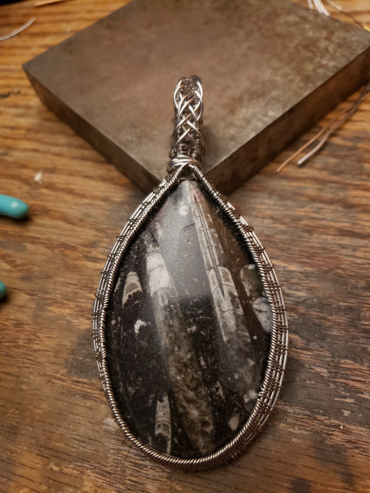 Hand wrapped Orthoceras fossil pendant